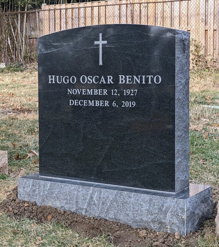 Granite memorial lettered for the Benito family, installed in a cemetery